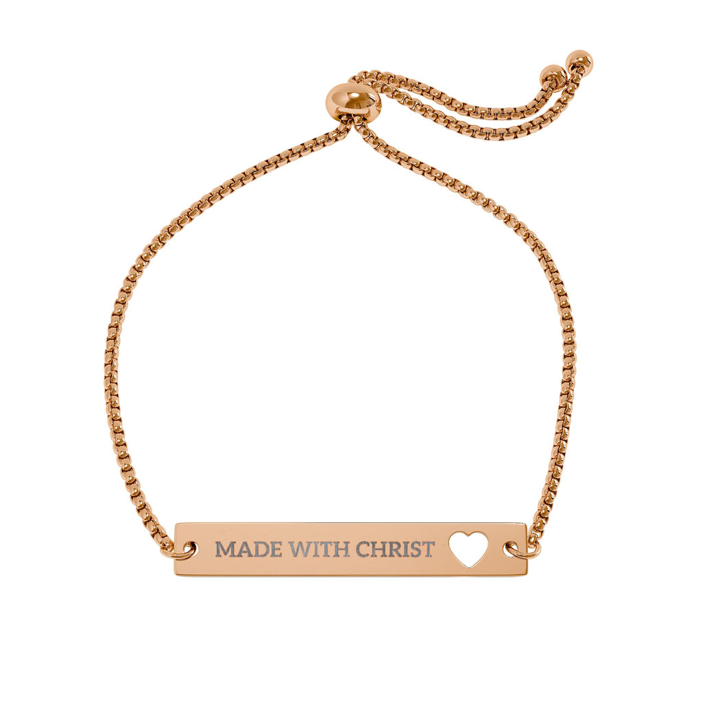 Gold engravable heart bar bracelet with "Made With Christ" inscription, adjustable jewelry accessory from Printify.